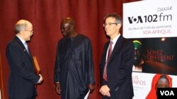 VOA correspondent Idrissa Fall alongside U.S. Ambassador James P. Zumwalt and BBG Director of Strategy and Development Bruce Sherman.