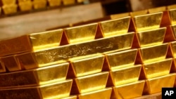 FILE - Gold bars are seen in London, Nov. 16, 2007.