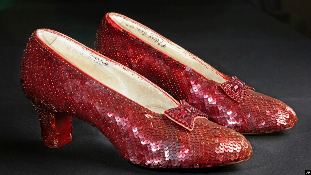 FILE - Sequin-covered ruby slippers worn by Judy Garland in 'The Wizard of Oz' appear at the offices of Profiles in History in Calabasas, Calif. on Nov. 9, 2001.