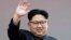FILE - North Korean leader Kim Jong Un waves at parade participants at the Kim Il Sung Square in Pyongyang, North Korea, May 10, 2016