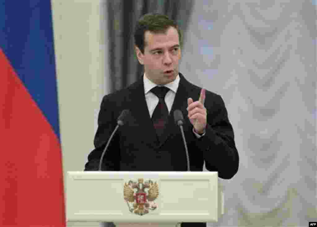 Russian President Dmitry Medvedev delivers a speech during an awarding ceremony in the Kremlin in Moscow, Thursday, Dec. 30, 2010. (AP Photo/Alexander Natruskin, Pool)