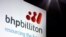 FILE - A promotional sign adorns a stage at a BHP Billiton function in central Sydney, Australia August 20, 2013.