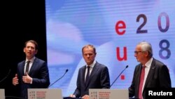 European Council President Donald Tusk (from right), European Commission President Jean-Claude Juncker and Austrian Chancellor Sebastian Kurz hold a news conference after the informal meeting of European Union leaders in Salzburg, Austria, Sept. 20, 2018. 