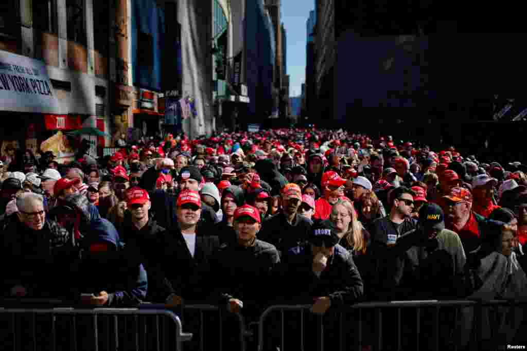 Supporters gather outside Madison Square Garden on the day of a rally for Republican presidential nominee and former U.S. President Donald Trump, in New York.