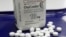 FILE - OxyContin pills, an opioid drug, are seen at a pharmacy in Montpelier, Vermont, Feb. 19, 2013. Americans, even though they comprise only five percent of the world's population, consume 80 percent of the its supply of pain medications.