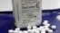 FILE - OxyContin pills, an opioid drug, are arranged for a photo at a pharmacy in Montpelier, Vermont, Feb. 19, 2013. The U.S. House passed a bill targeting addiction to pain medication.