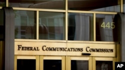 FILE - This June 19, 2015, photo shows the Federal Communications Commission building in Washington.