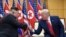 U.S. President Donald Trump and North Korean leader Kim Jong Un meet in the Demilitarized Zone, South Korea, June 30, 2019.