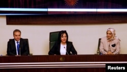 Vala Fareed, interim Speaker of Parliament (C), speaks during a session in Erbil, Iraq, Feb. 18, 2019. 