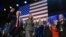 Former President Donald Trump gestures as he walks with former first lady Melania Trump at an election night watch party at the Palm Beach Convention Center, Wednesday, Nov. 6, 2024, in West Palm Beach, Fla. (AP Photo/Evan Vucci)