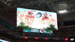 The scoreboard displays an image celebrating the Kansas City Chiefs as Super Bowl champions after the NFL Super Bowl 54 football game between the San Francisco 49ers and Kansas City Chiefs, Feb. 2, 2020, in Miami Gardens, Fla.