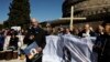 Sex abuse survivor Peter Isley, of the Ending Clergy Abuse organization, delivers his speech at the end of a demonstration in downtown Rome, Feb. 23, 2019. 