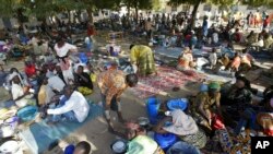 FILE - Chadian refugees are seen inside a refugee camp at the border town of Kousseri, Cameroon, Feb. 7, 2008.