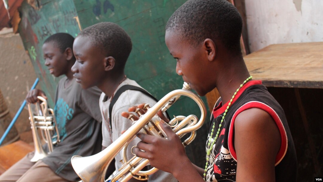 The children living at M-lisada practice their instruments every day, Kampala, Uganda, Oct. 11, 2013. (VOA/Hilary Heuler)