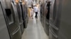FILE - Shoppers examine refrigerators at a Home Depot store in Boston, Sept. 23, 2019. The U.S. announced May 3, 2021, that it will phase out hydrofluorocarbons found in refrigerators, freezers and air conditioners. 