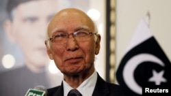 FILE - Adviser to Pakistan's Prime Minister on National Security and Foreign Affairs Sartaj Aziz listens to a question during a news conference with Iranian Foreign Minister Javad Zarif at the Foreign Ministry in Islamabad, April 8, 2015. 