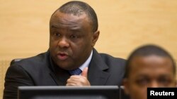 Jean-Pierre Bemba, a former vice president of the Democratic Republic of Congo, speaks at the opening of his trial in The Hague, Nov. 22, 2010. 