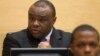 FILE - Jean-Pierre Bemba, a former vice president of the Democratic Republic of Congo, speaks at the opening of his trial in The Hague, Nov. 22, 2010. 