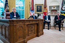 President Donald Trump speaks during a meeting with Senate Majority Leader Mitch McConnell of Ky., and House Minority Leader Kevin McCarthy of Calif., in the Oval Office of the White House, Monday, July 20, 2020, in Washington.