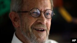 FILE - Author Elmore Leonard, 86, smiles during an interview at his home in Bloomfield Township, Michigan, Sept. 17, 2012.