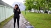 Katerina Borisevich, a journalist for the independent Tut.by news website, speaks on a mobile phone after being released from prison in the town of Gomel, some 310kms south-east of Minsk on May 19, 2021. 