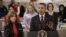 President Barack Obama, accompanied by American Red Cross President and CEO Gail J. McGovern, gestures while speaking during his visit to discuss superstorm Sandy, at the Disaster Operation Center of the Red Cross National Headquarters in Washington, Oct.