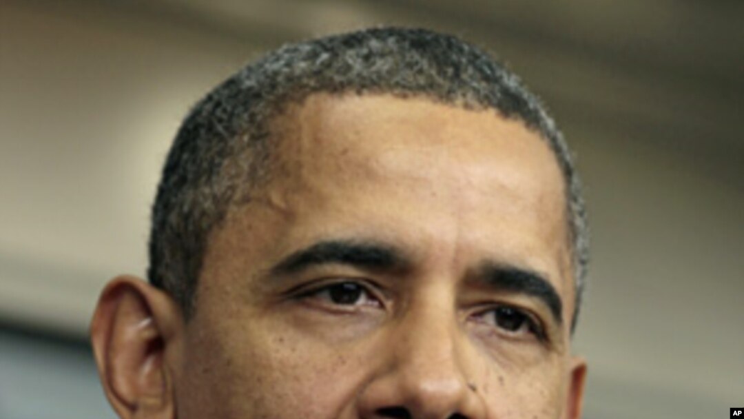 President Barack Obama in the White House briefing room, Dec. 8, 2011.