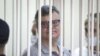 Tribunal en Bielorrusia condena a precandidato opositor a 14 años de prisión