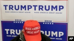 FILE - Richard D. Irving at Team Trump New Hampshire headquarters waiting beforehand to hear from House Republican Conference Chair Elise Stefanik, at a campaign event, January 20, 2024, in Manchester, NH. 