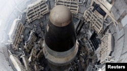 FILE - A Titan missile, shown during a tour of the 103-foot Titan II intercontinental ballistic missile site that was decommissioned in 1982, at the Titan Missile Museum in Sahuarita, Ariz., Feb. 2, 2019.