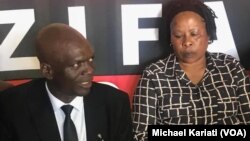 ZIFA PRESIDENT FELTON KAMAMBO AND BOARD MEMBER BARBRA CHIKOSI.j