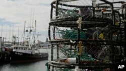 Crab pots are stacked along a pier at Fisherman's Wharf in San Francisco, Nov. 5, 2015. 