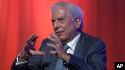 Peruvian writer Mario Vargas Llosa speaks during an electoral campaign for the Catalan regional election in Barcelona, Spain, Dec. 16, 2017.