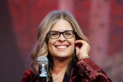 FILE - Director Jennifer Lee smiles during a press conference for her new movie "Frozen 2" in Seoul, South Korea, Nov. 25, 2019.