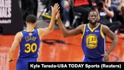  Draymond Green, à droite, avec son coéquipier Stephen Curry, Toronto, Canada, le 2 juin 2019. (Kyle Terada-USA TODAY Sports)