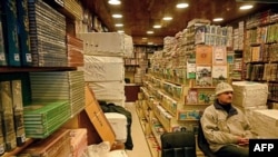 A shopkeeper waits for customers at a bookshop in Srinagar, India, Feb. 18, 2025. Police raided dozens of bookshops across the disputed territory and seized hundreds of copies of books authored by Abul A'la Maududi, a pre-eminent Islamic scholar.