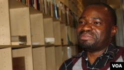 Music historian Evans Netshivhambe inside the archives of the Southern African Music Rights Organization in Johannesburg. He says he's not shocked that gospel is the most listened to music genre in the country. (Darren Taylor for VOA News)