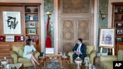 FILE - German Foreign Minister Annalena Baerbock, left, speaks with Moroccan Foreign Minister Nasser Bourita during her official visit to Rabat, Morocco, Thursday, Aug. 25, 2022.