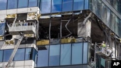 ساختمان آسیب دیده از حمله پهپادی اوکراین در منطقه تجاری در مسکو. ۳۰ ژوئیه ۲۰۲۳. 