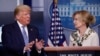 FILE - President Donald Trump asks a question of Dr. Deborah Birx, White House coronavirus response coordinator, during a briefing about the coronavirus in the James Brady Briefing Room, March 23, 2020, in Washington.