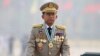 FILE - Myanmar's Commander-in-Chief Senior General Min Aung Hlaing presides an army parade on Armed Forces Day in Naypyitaw, Myanmar, March 27, 2021. 