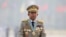 FILE - Myanmar's Commander-in-Chief Senior General Min Aung Hlaing presides an army parade on Armed Forces Day in Naypyitaw, Myanmar, March 27, 2021.