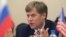 U.S. Ambassador to Russia Michael McFaul gestures during his meeting with deputies of the United Russia party at Russia's State Duma, lower house of parliament, in Moscow, May 25, 2012.