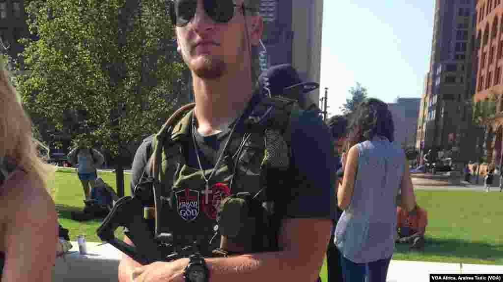 Civilian armed with assault rifle under Ohio's open carry gun laws.