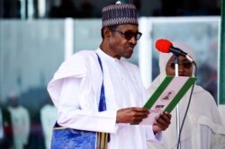 FILE - Nigerian President Muhammadu Buhari is sworn in for a second four-year term in Africa's most populous nation in Abuja, Nigeria, May 29, 2019.