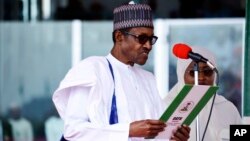 Nigerian President Muhammadu Buhari is sworn in for a second four-year term in Africa's most populous nation in Abuja, Nigeria, May 29, 2019. 