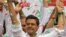 Presidential candidate Enrique Pena Nieto of the Institutional Revolutionary Party flashes a thumbs up at supporters at the end of his closing campaign rally in Toluca, Mexico, June 27, 2012. 