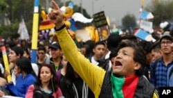 A man yells during a protest asking for a hike in the budget for public higher education, in Bogota, Colombia, Nov. 15, 2018. 