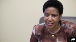 FILE - Phumzile Mlambo-Ngcuka, United Nations Under-Secretary-General and Executive Director of U.N. Women, speaks during an interview with The Associated Press in New York, March 7, 2018. 