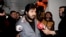 FILE - Turkish-Iranian businessman Reza Zarrab, charged in the U.S. with allegedly evading sanctions on Iran, is surrounded by reporters as he arrives at a courthouse in Istanbul, in a separate case against him, Dec. 17, 2013.